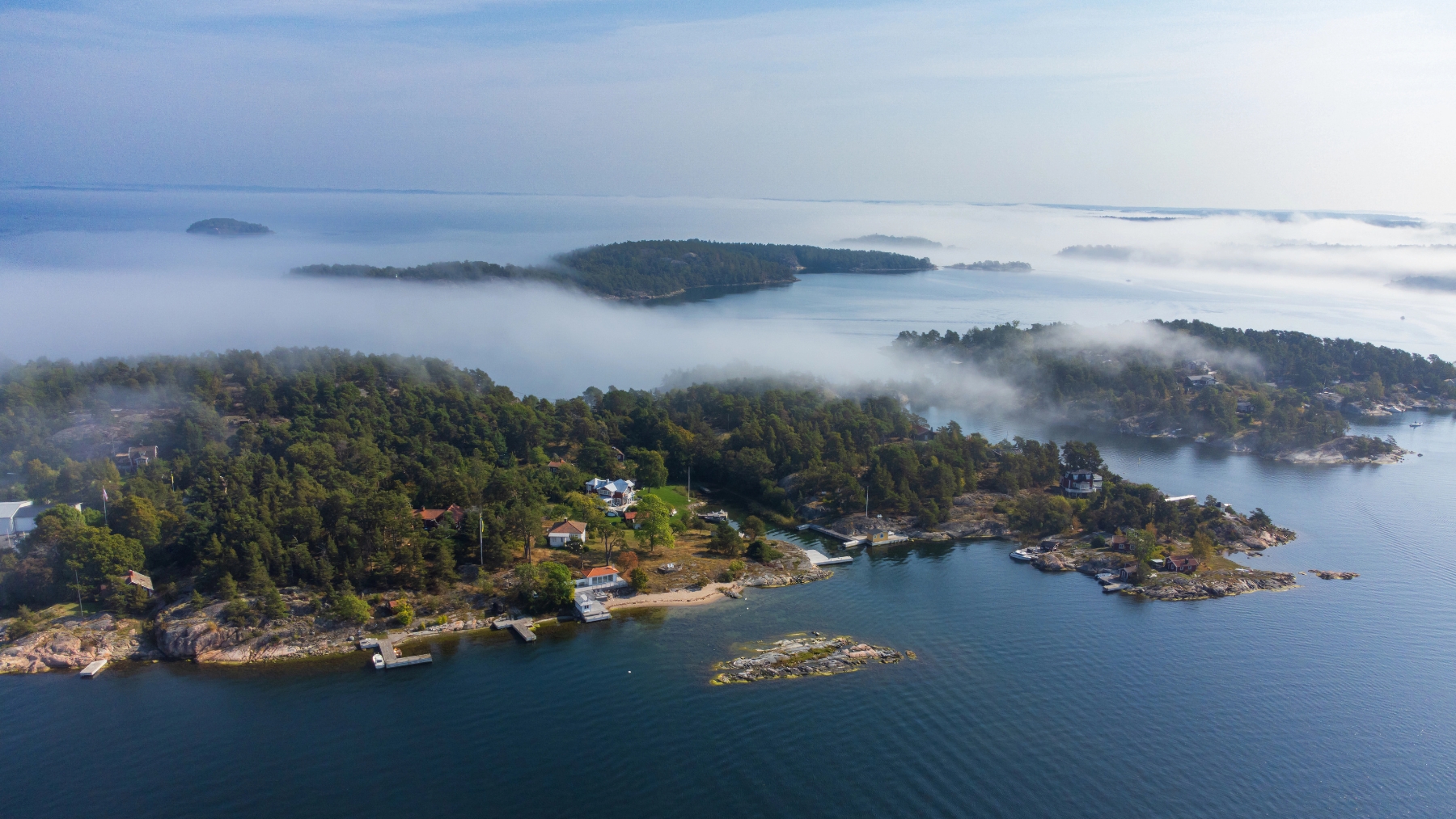 Nordic archipelago in morning mist